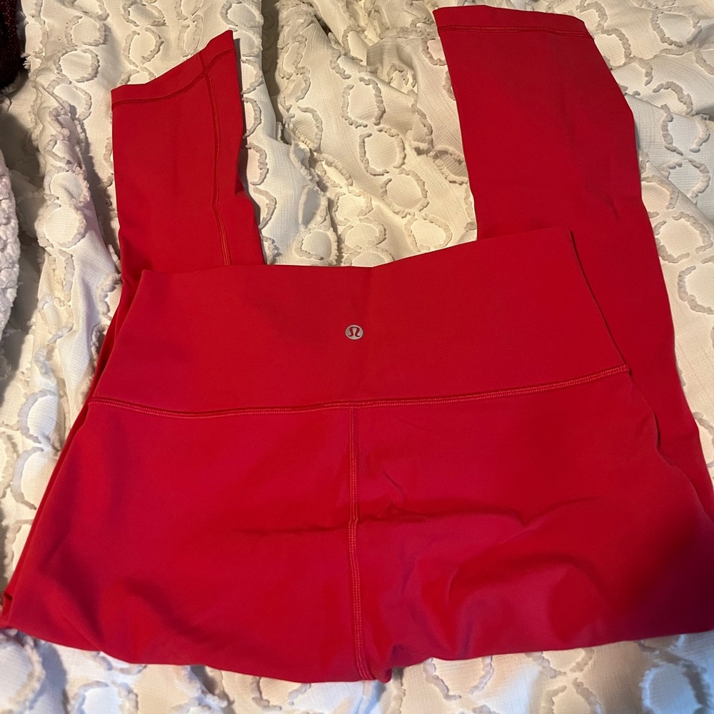 Coral colored lululemon leggings size 8